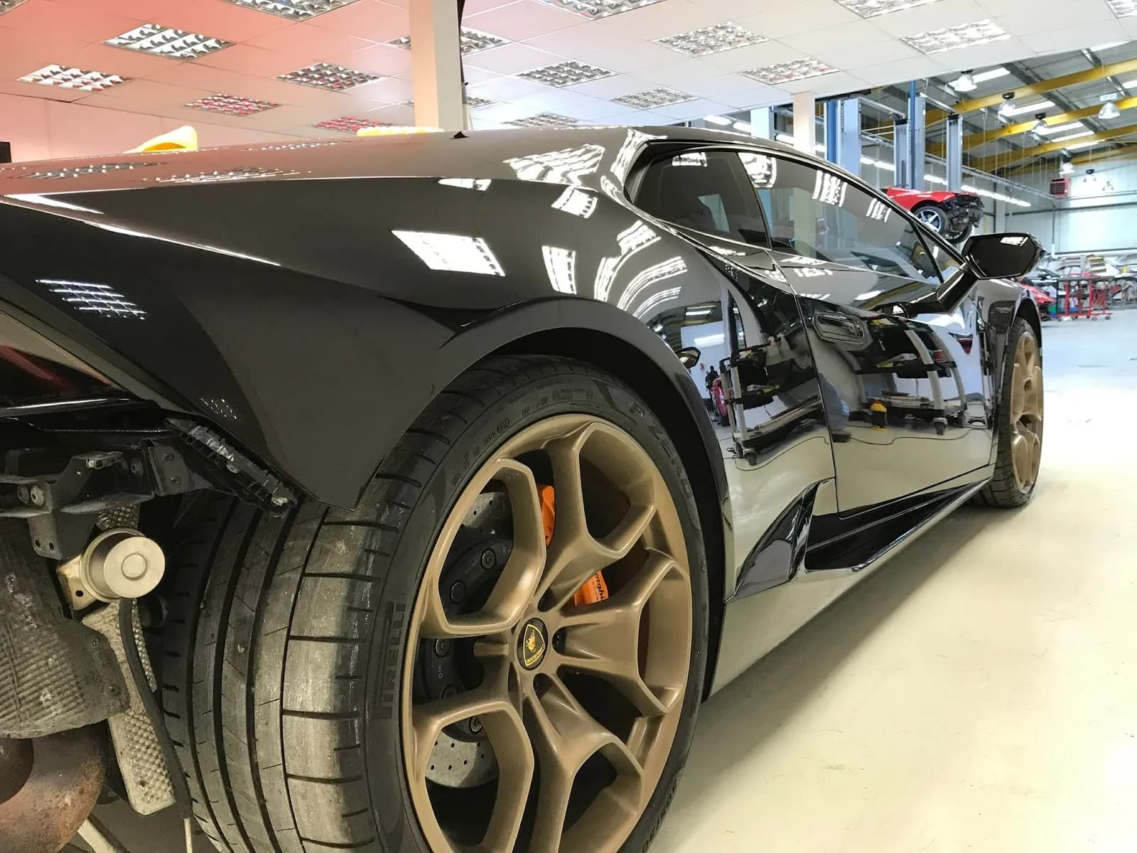 Black sports car prepared and finished in the Lusso Auto Care workshop